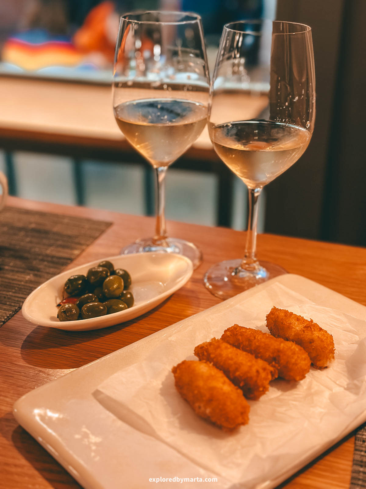 Trying local food at Tragatá restaurant in Ronda, Spain