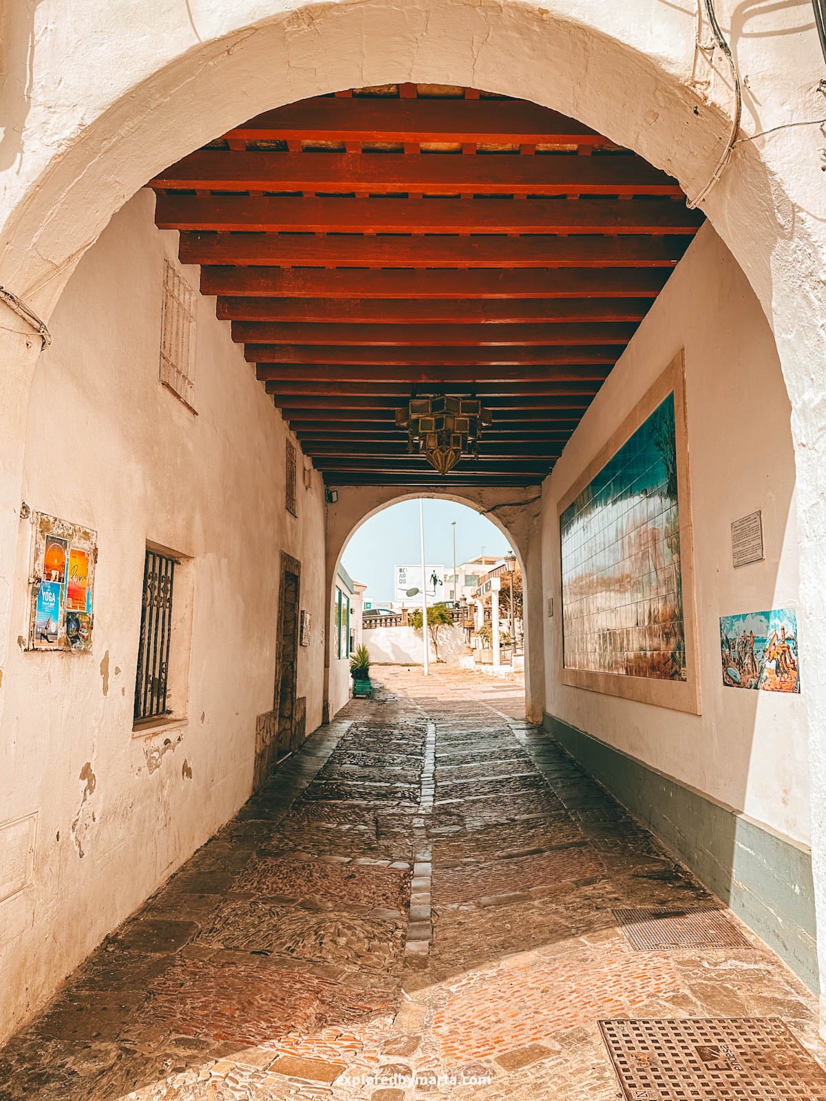 Tunnel of the Lamp of the Winds in Tarifa old town, Spain