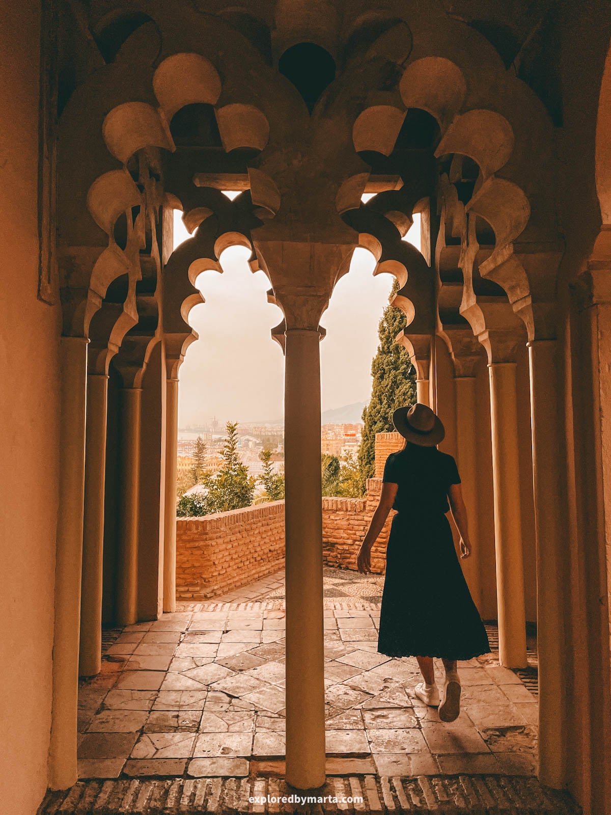Moorish arches at Alcazaba de Málaga in Malaga, Spain