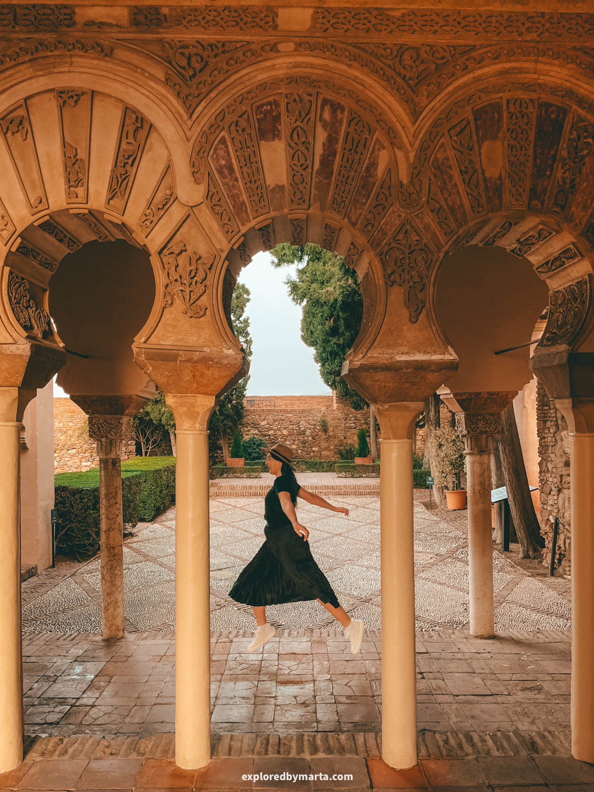 Moorish arches at Alcazaba de Málaga in Malaga, Spain