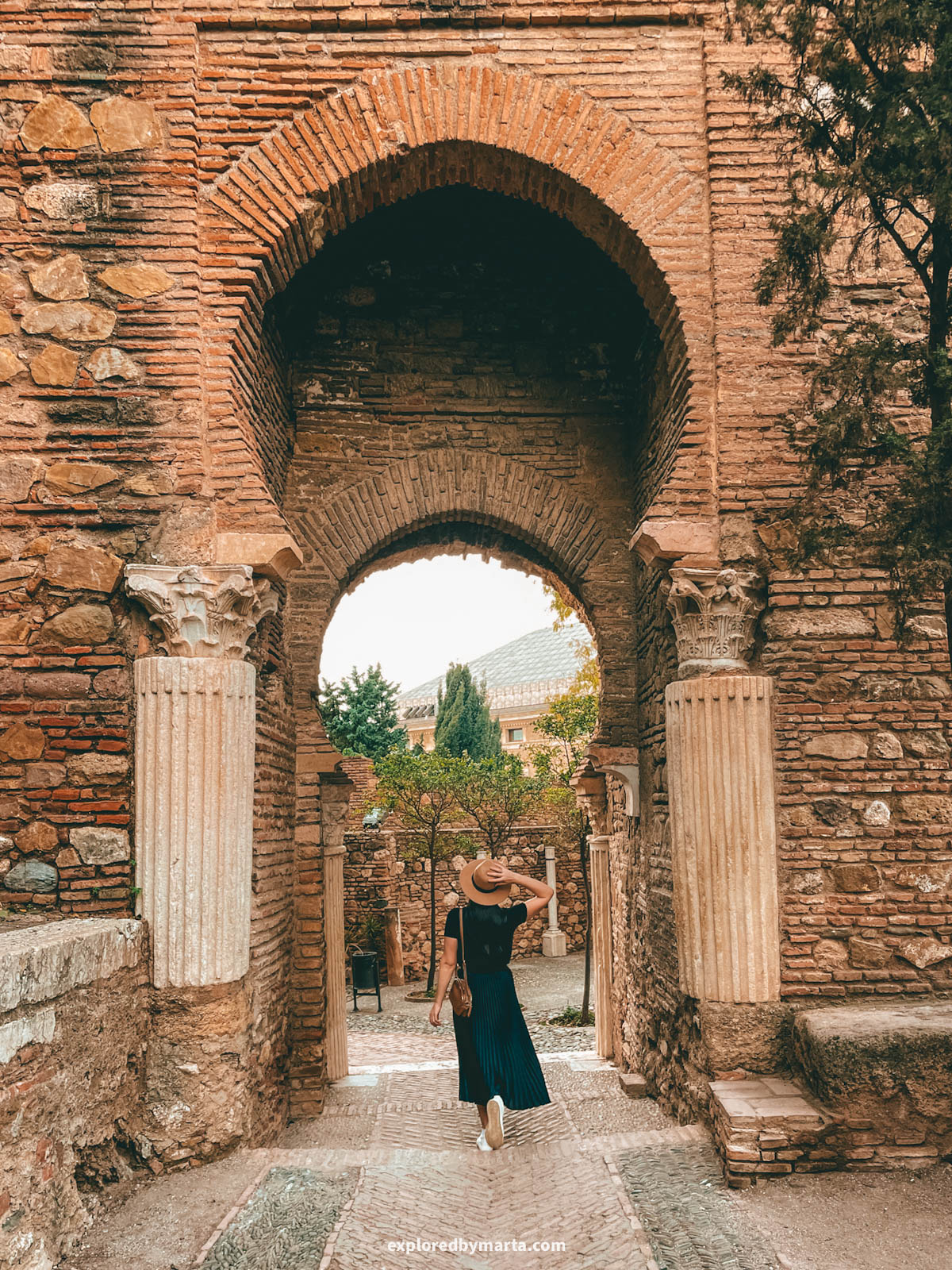 Arched entrance to Alcazaba de Málaga in Malaga, Spain