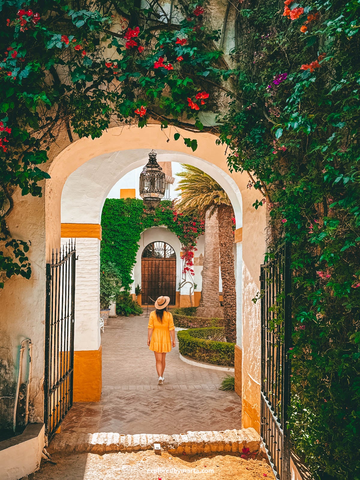 Blooming gardens at Palacio de las Dueñas in Seville, Spain