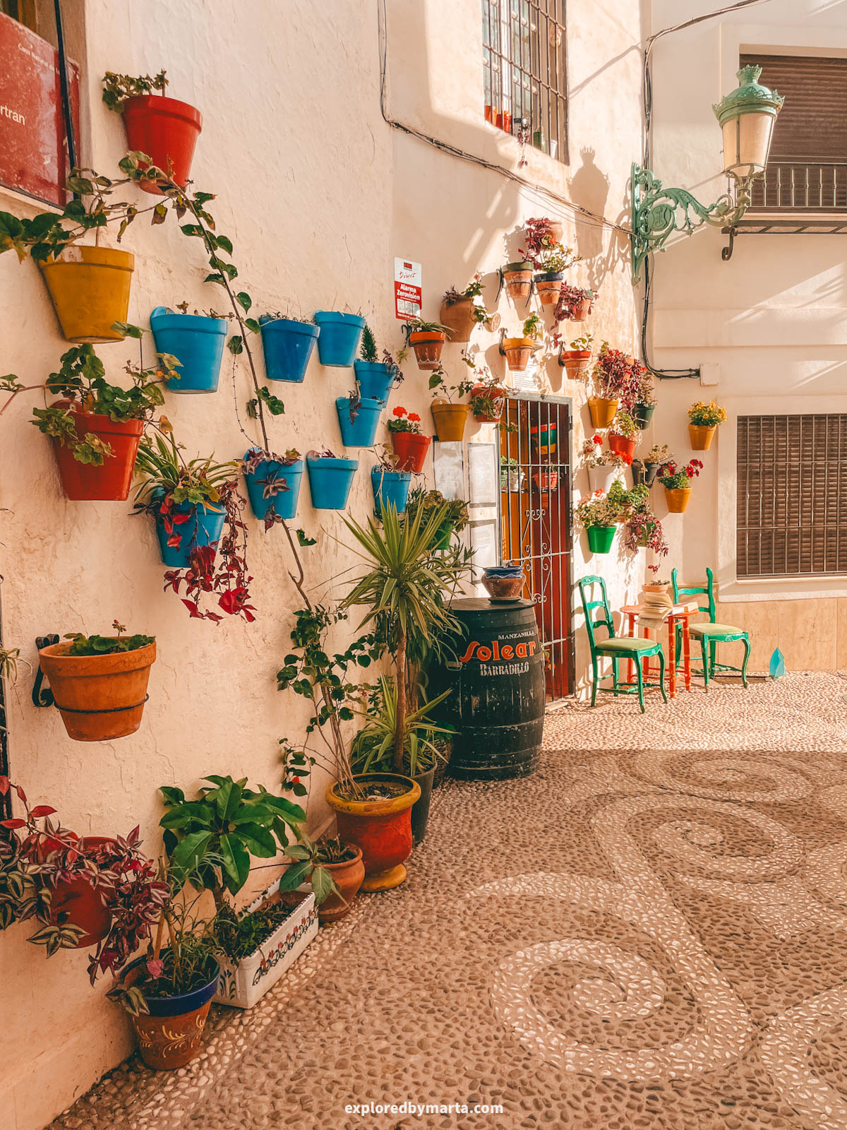 Calle Tajillo flower-filled street in Nerja, Spain