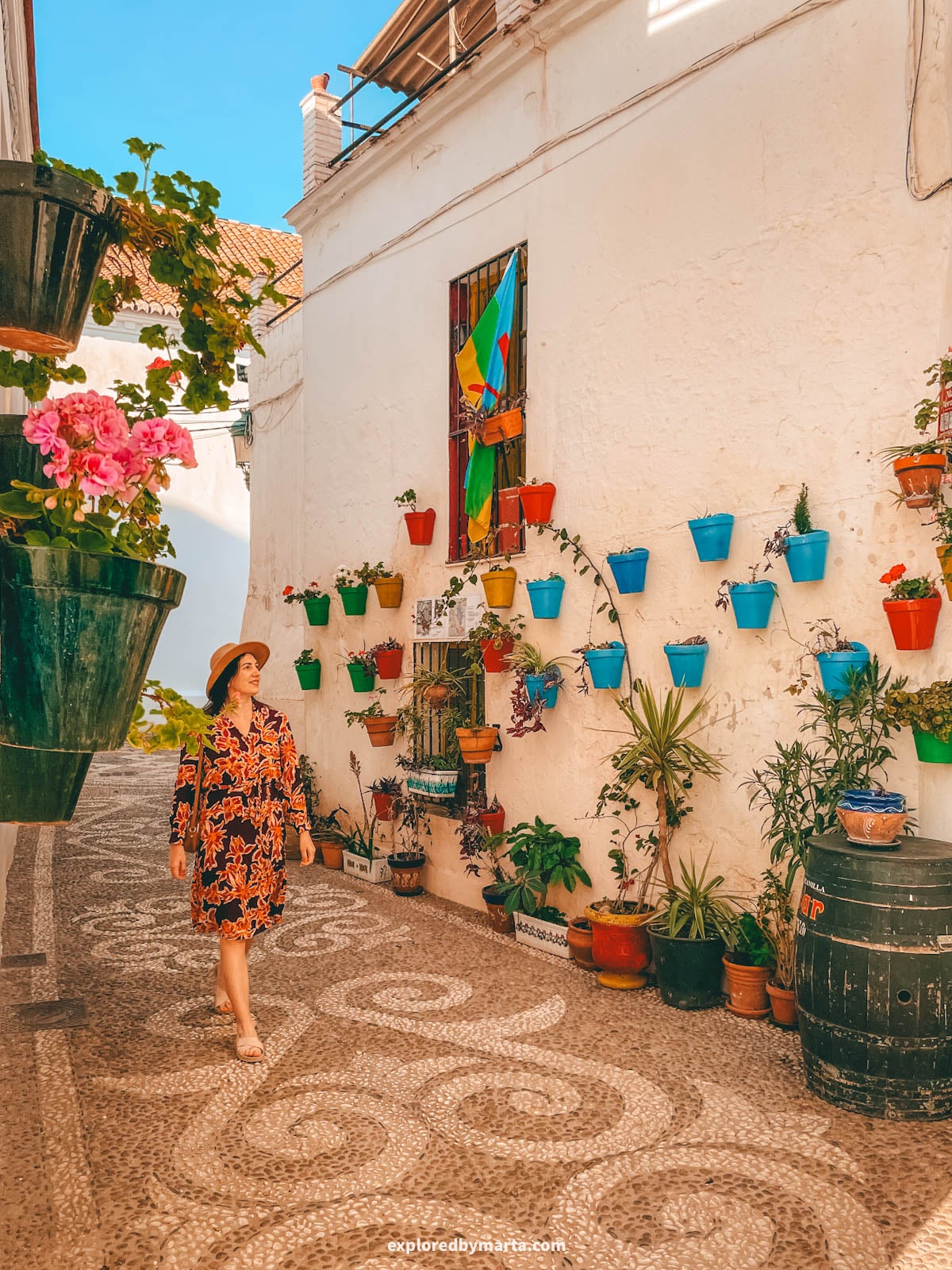 Calle Tajillo flower-filled street in Nerja, Spain