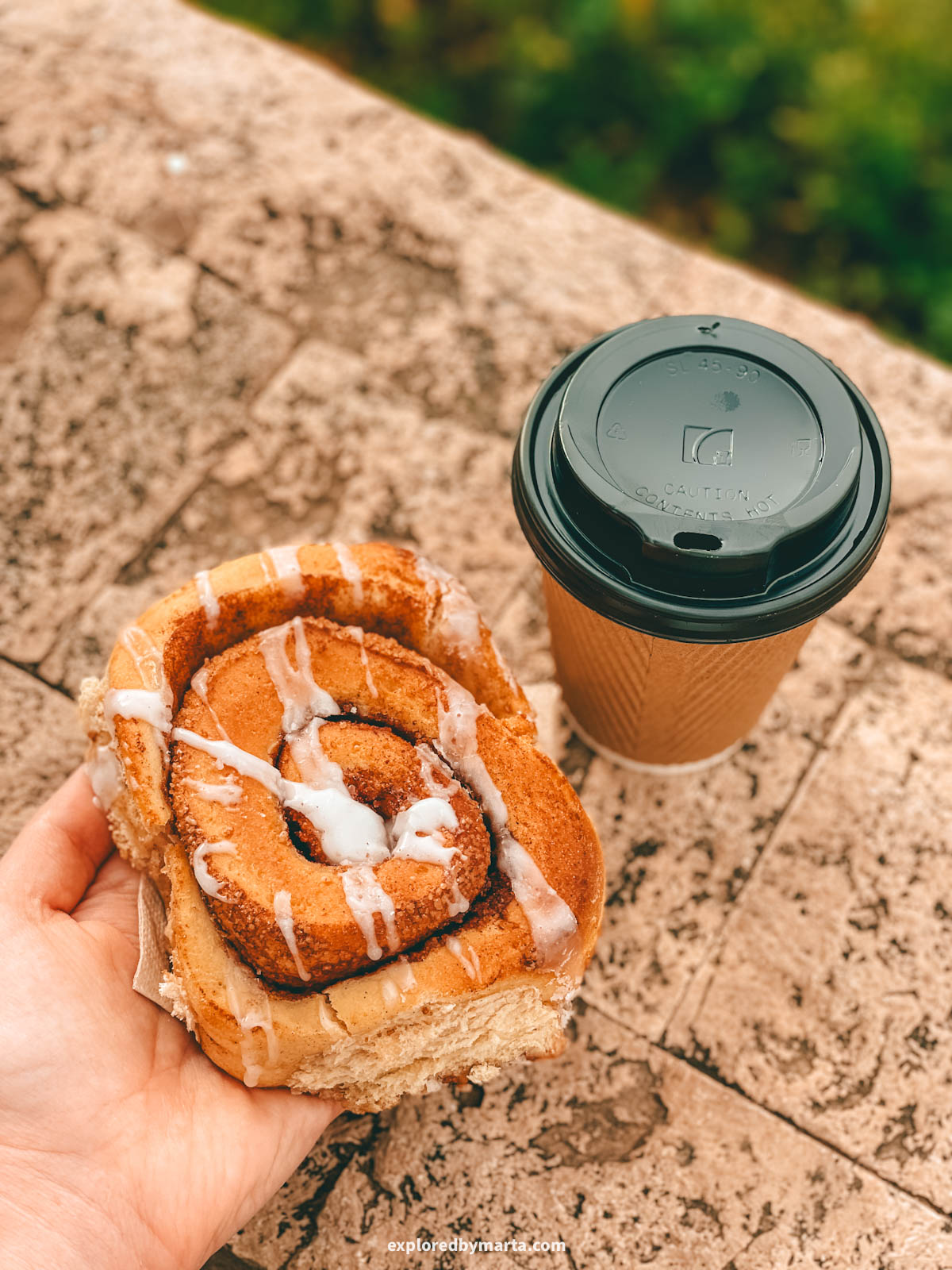 Coffee and cinnamon roll from Delicotte Specialty Coffee & Tea in Malaga, Spain