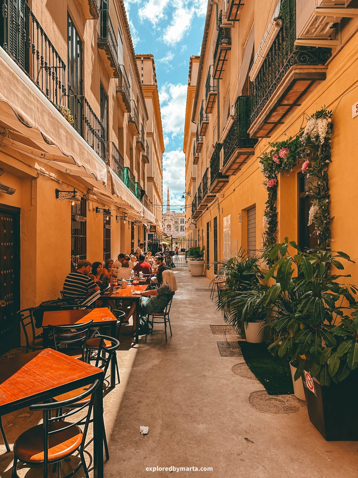 Eating Spanish tapas at Picasso Bar Tapas, right on the lively Plaza de la Merced square in Malaga, Spain