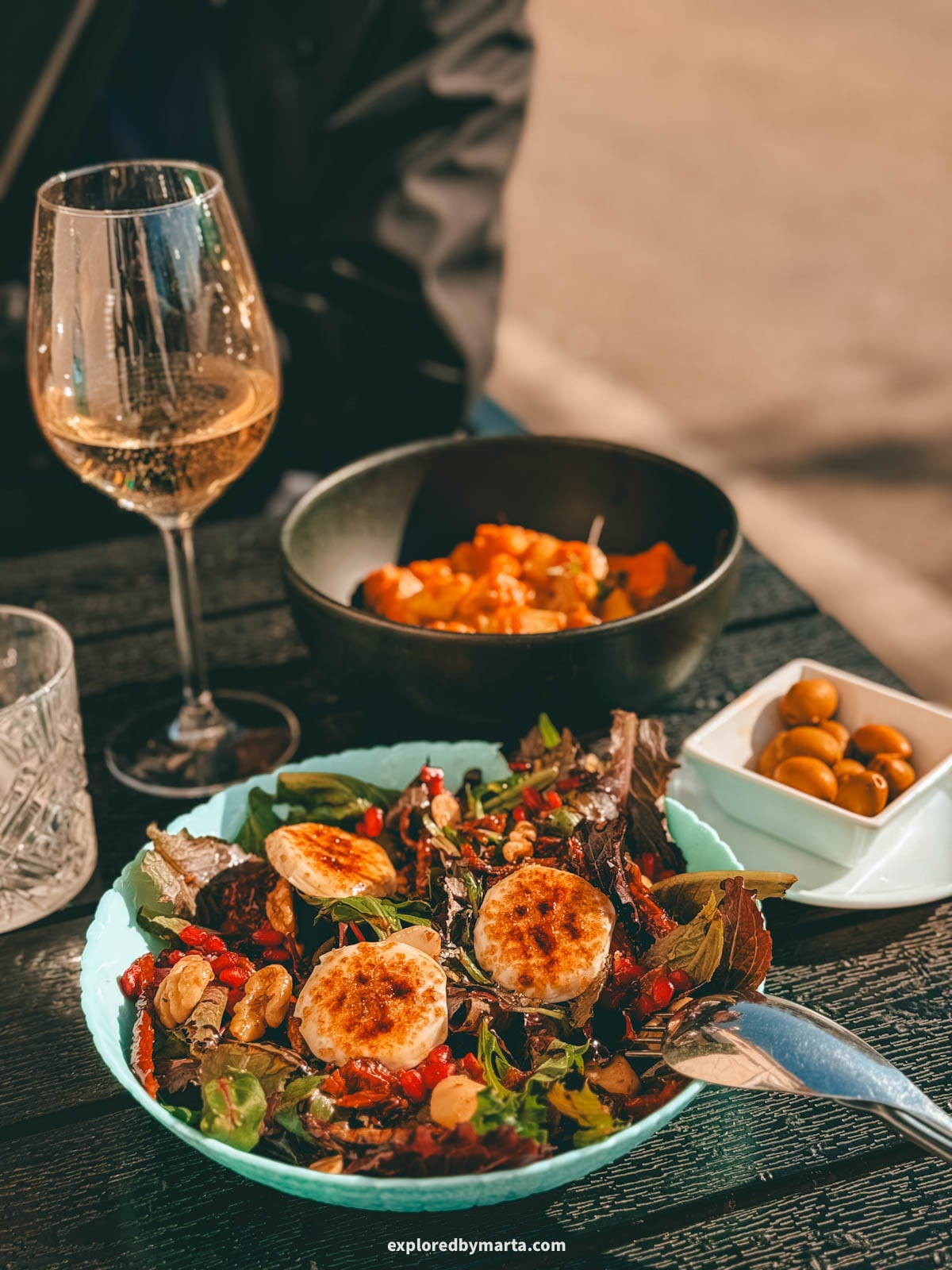 Glass of wine and tapas for lunch at Gastro-Bar Tapetece in Guadalest, Spain