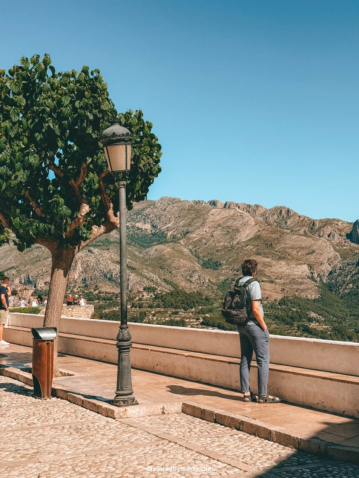 Looking out at the mountains from Plaza de San Gregorio in Guadalest, Spain