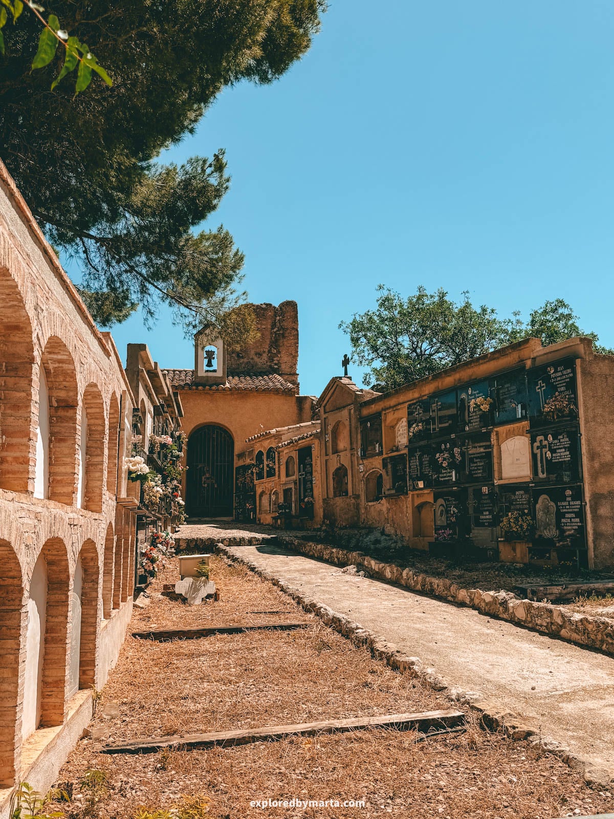 Old cemetery of Guadalest with its arched niches and chapel in Spain
