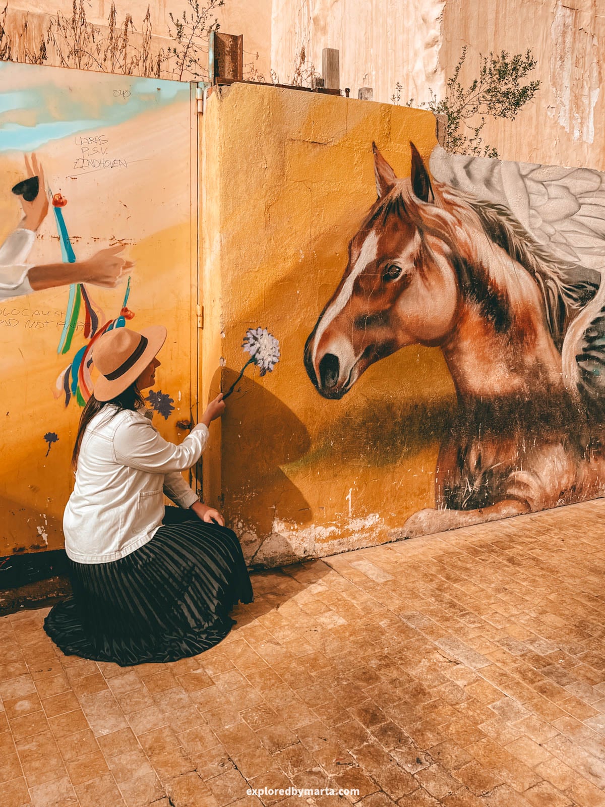 Street art at Plaza de la Judería in Malaga, Spain