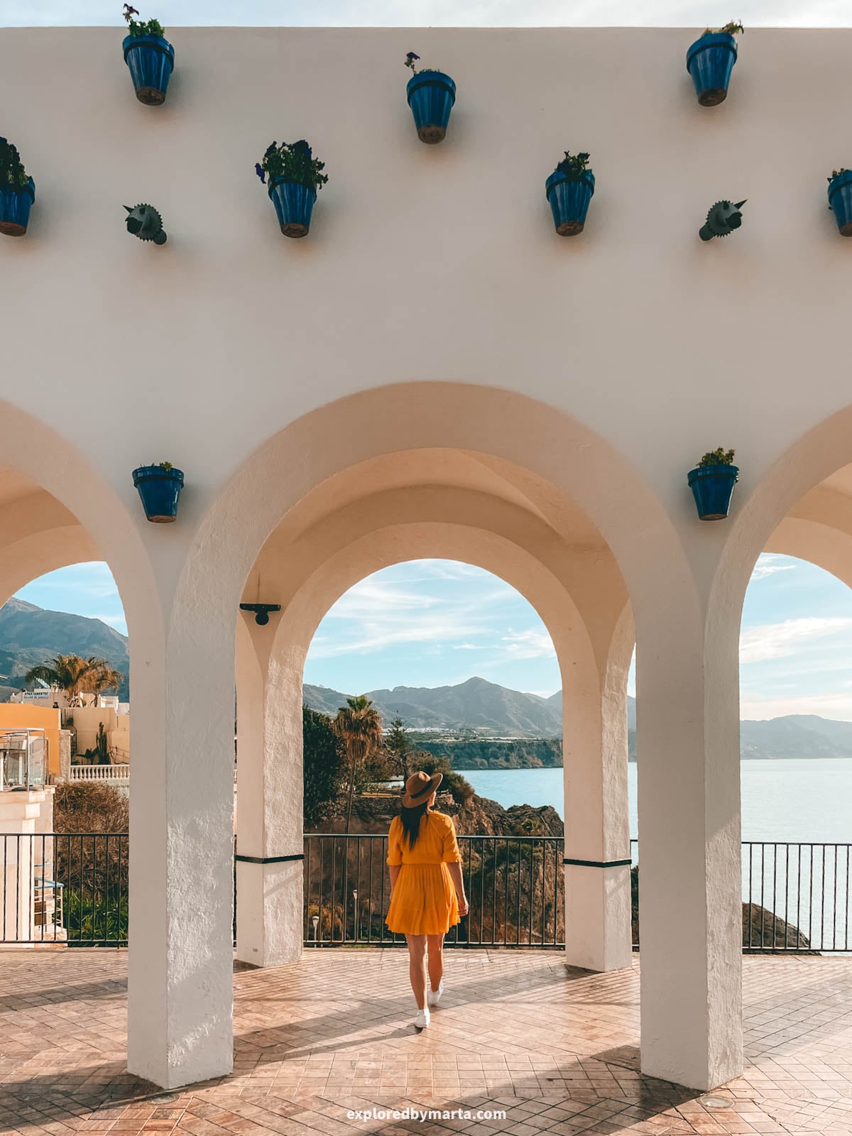 White arches at Plaza Balcón de Europa in Nerja, Spain