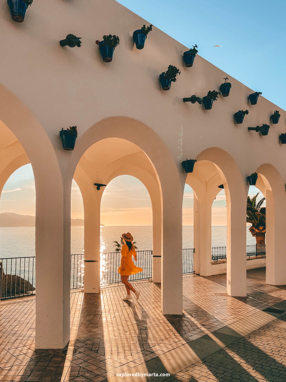 White arches at Plaza Balcón de Europa in Nerja, Spain