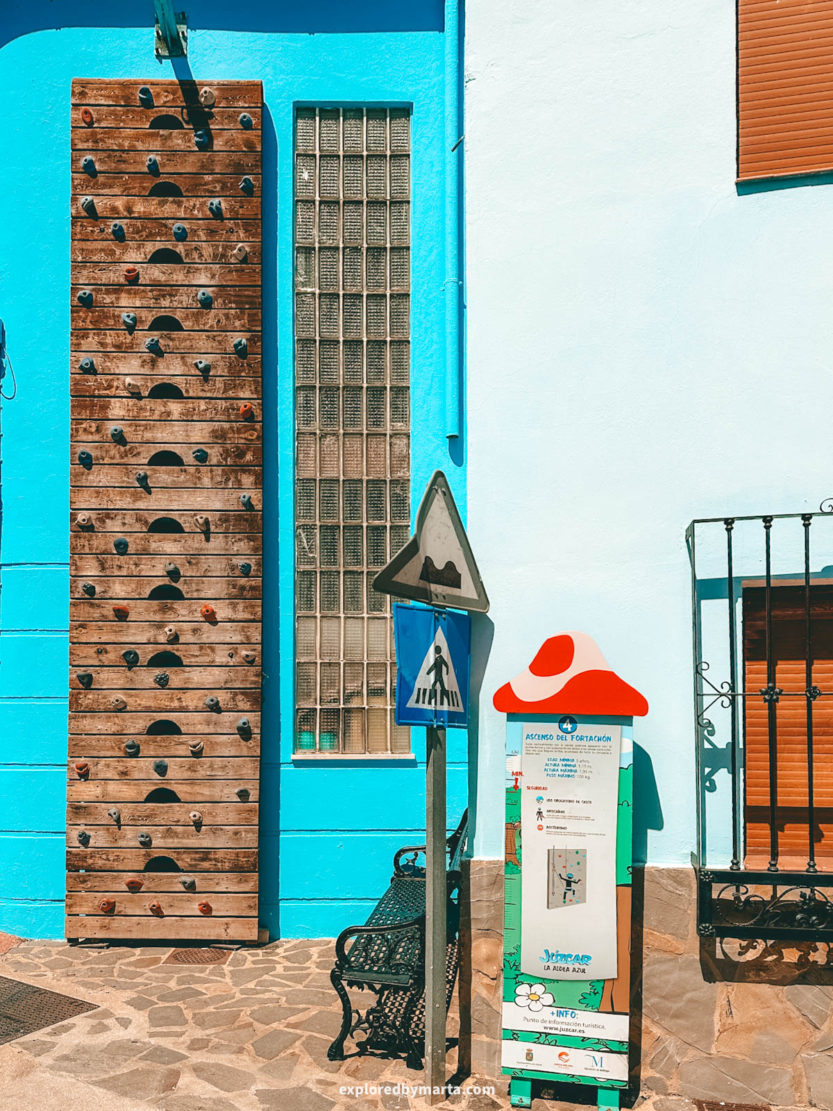 Climbing wall attraction in Juzcar village in Spain