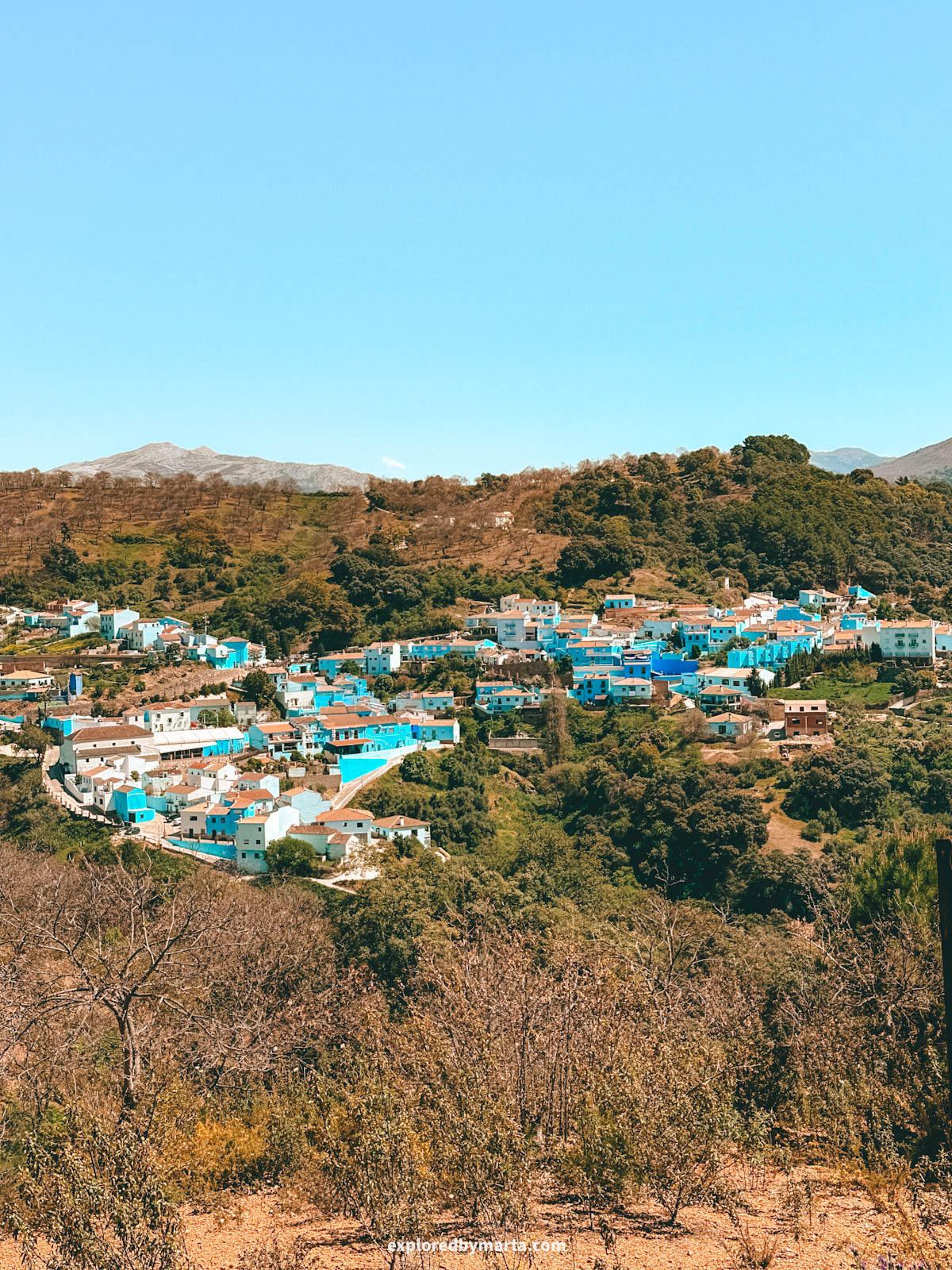 View of the blue Smurf village from Mirador del Pueblo de Júzcar in Spain