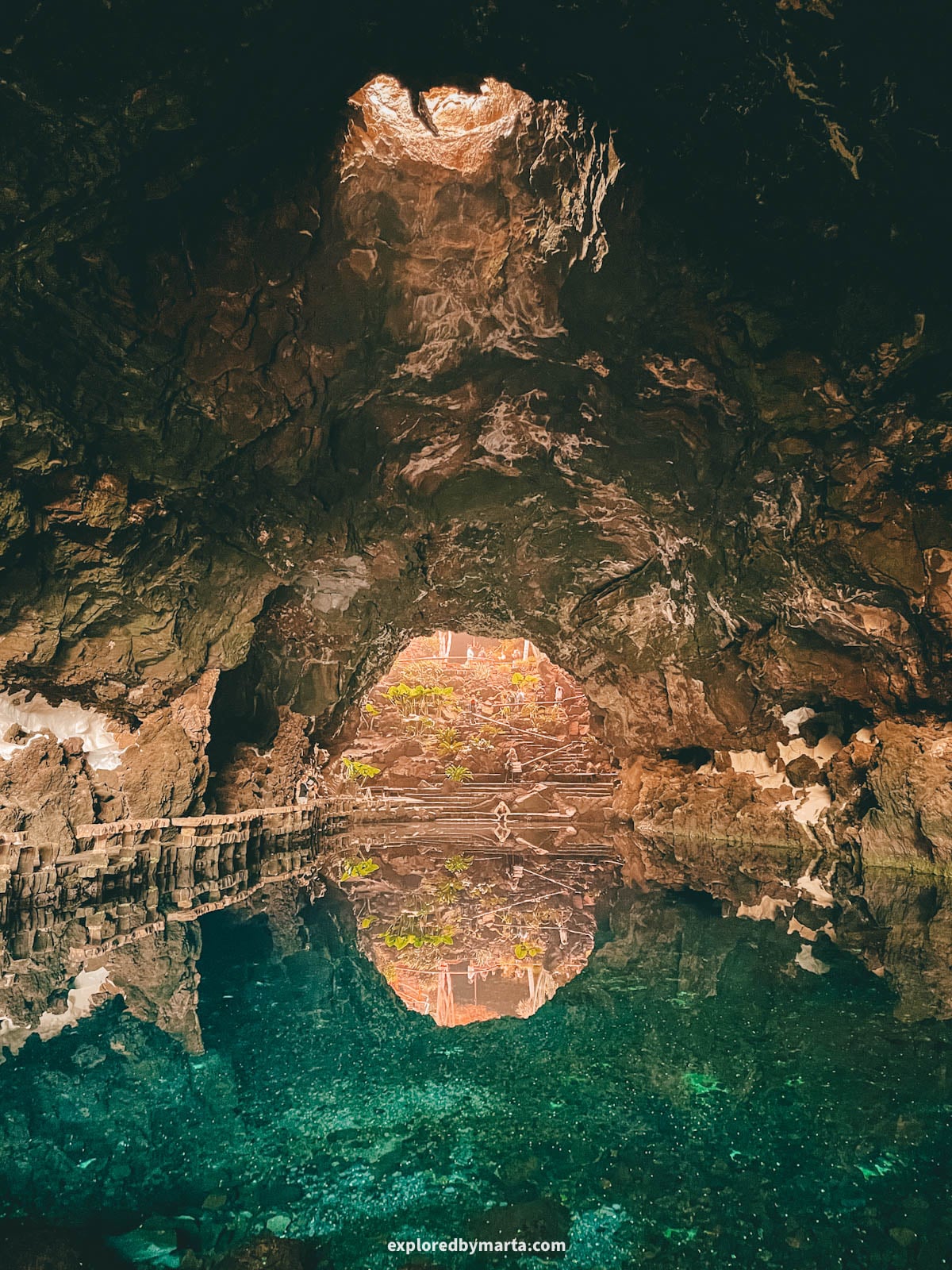 Lava tunnel with a lake at Jameos del Agua by César Manrique in Lanzarote, Spain