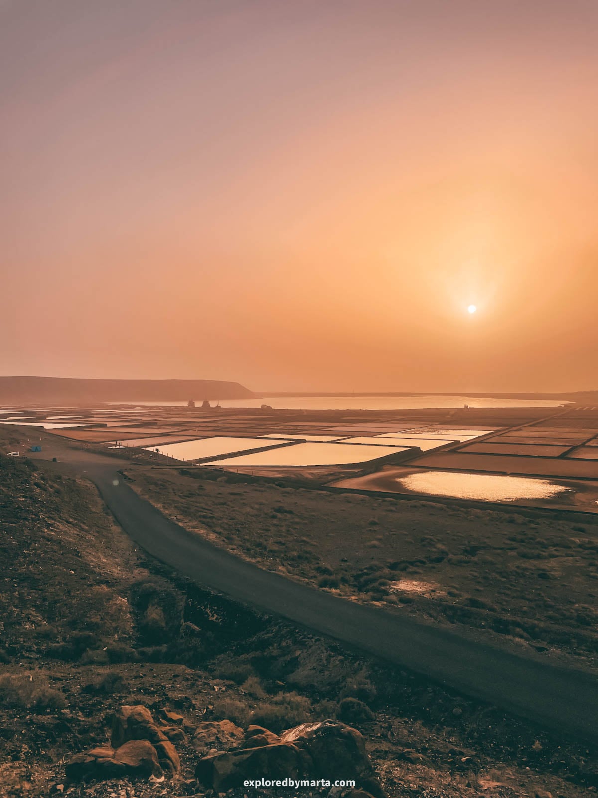 Salinas de Janubio salt lagoons at sunset in Lanzarote, Spain