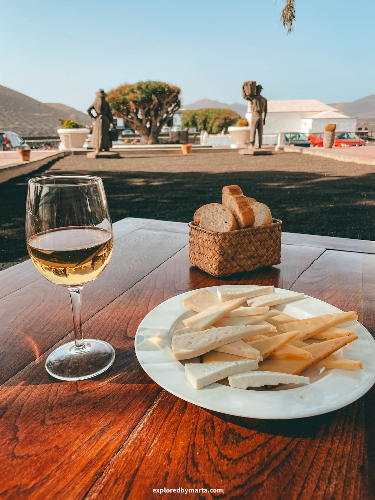 Volcanic wine and cheese in the famous La Geria vineyards in Lanzarote, Spain